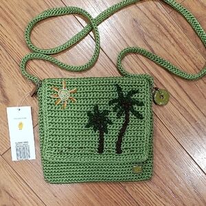 The Sak Green Crochet Crossbody Bag with Palm Tree Motif